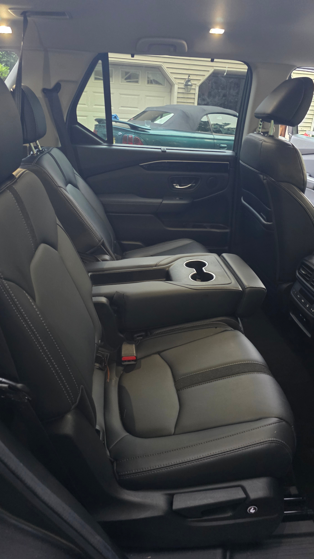 Captain's chairs and center console freshly detailed