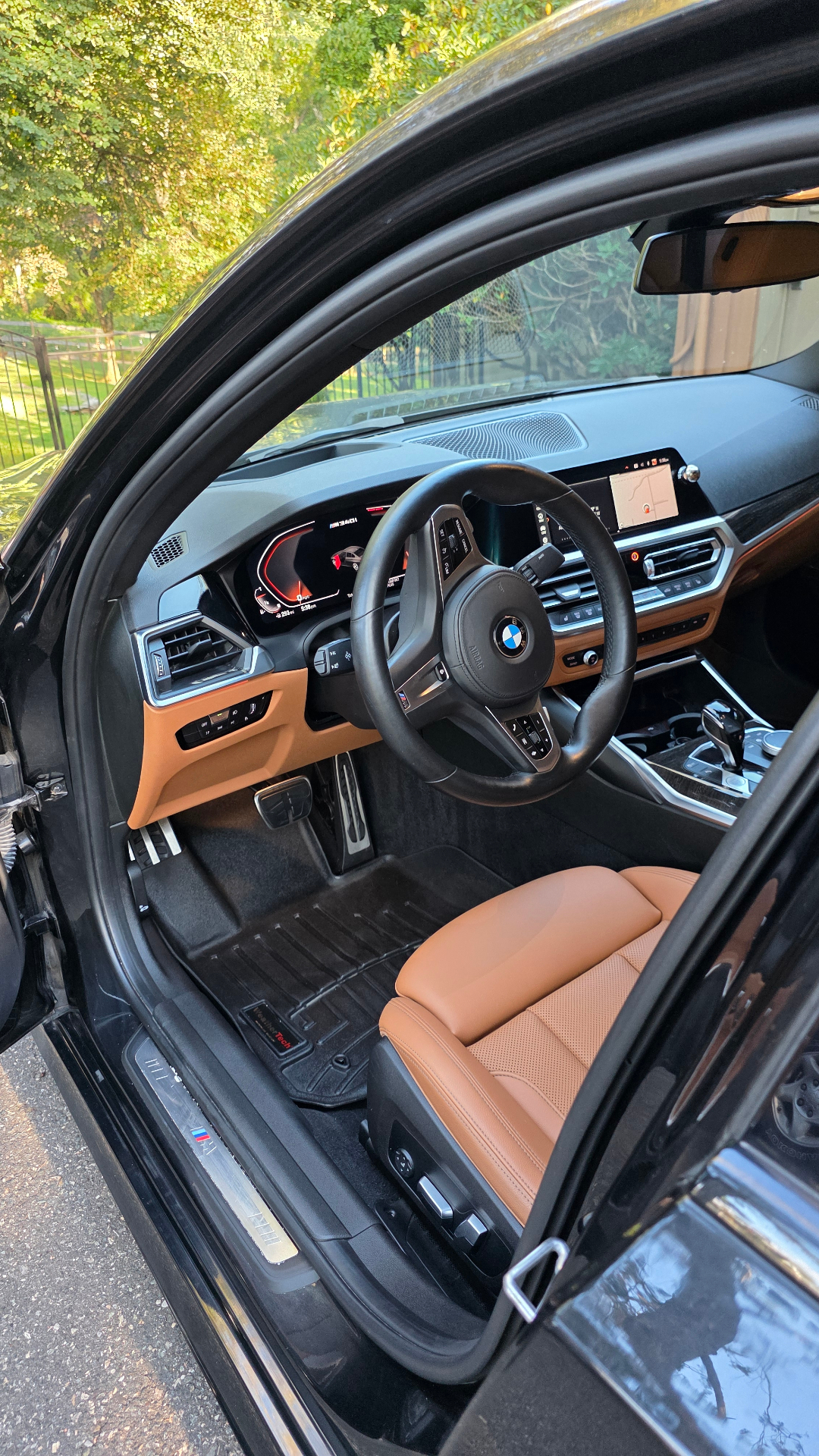 BMW cockpit with cognac leather seats and spotless dash